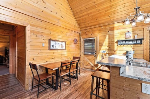 Cozy living space with leather seating, Smart TV, and gas fireplace