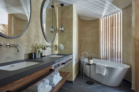 Luxury Suite, Balcony, Mountain View | Bathroom | Bathrobes, towels, soap, shampoo