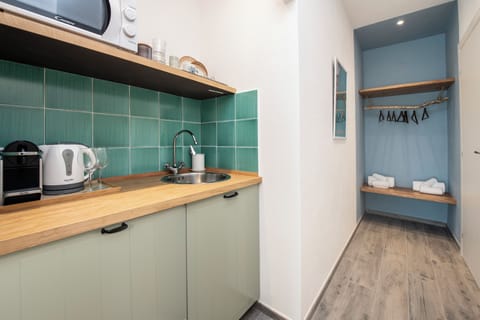 Superior Room, Kitchenette | Blackout drapes, iron/ironing board, free WiFi