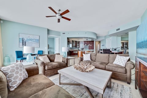 This thoughtfully designed living space maximizes natural light and integrates seamlessly with the surrounding environment. The open-concept layout and expansive windows create a bright and airy atmosphere.