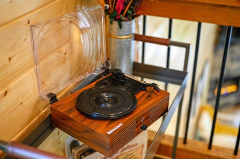 Spin your favorite tunes on this charming retro record player.