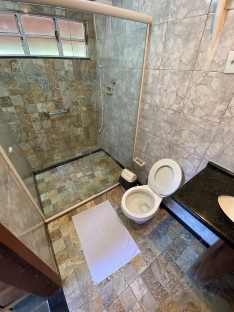 Premium Quadruple Room, River View | Bathroom | Shower, towels, toilet paper