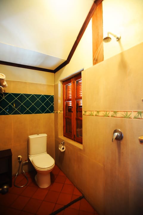 Lotus Room | Bathroom | Free toiletries, hair dryer, slippers, bidet