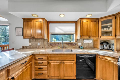 Kitchen: Keurig, Crockpot, blender, cooking utensils, tableware