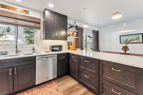 Kitchen: Fully equipped with drip coffee maker, Crockpot, French press, and Samsung appliances, main floor