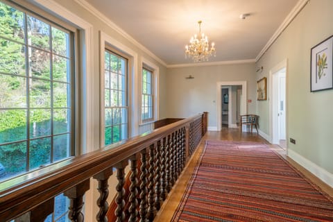 On the first floor, the landing leading to all the bedrooms