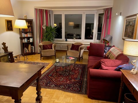 Large beautiful living room - evening view. Large table/desk space