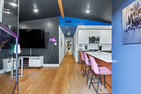 Living area with cozy seating and Smart TV (Unit A)