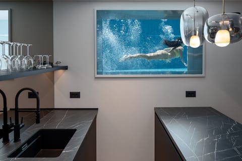 Kitchenette with an island and ice maker in Fun and Spa zone