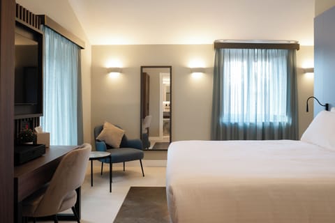 Comfort Double or Twin Room, City View | In-room safe, desk, laptop workspace, blackout drapes
