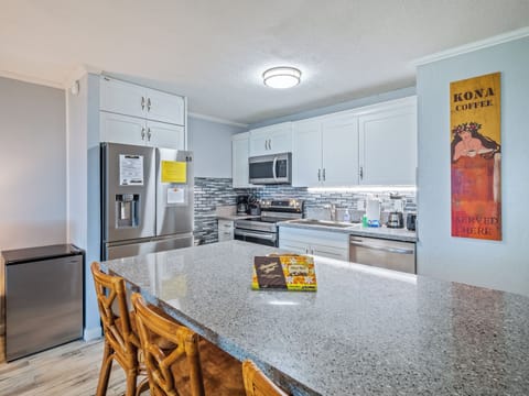 Condo, 1 King Bed with Sofa bed, Lanai, Garden View (Kalanikai #118) | Private kitchen | Fridge, microwave, oven, stovetop