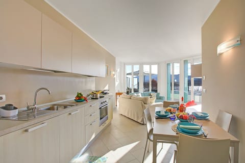Family Apartment, 2 Bedrooms, Lakeside (Sogno Sul Lago  Lake Front) | Private kitchen | Fridge, microwave, oven, stovetop