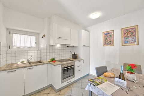 Family Apartment, 1 Bedroom (Lugano Bay View Uno) | Private kitchen | Fridge, oven, stovetop, dishwasher