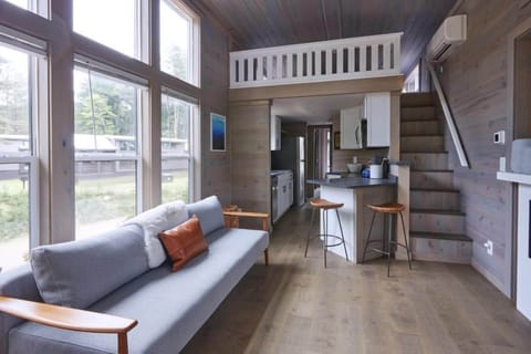 Premium Cabin, River View | Living area | 50-inch flat-screen TV with digital channels, TV