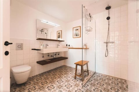 Deluxe Double Room, Patio, Garden View | Bathroom | Shower, hair dryer, bathrobes, towels