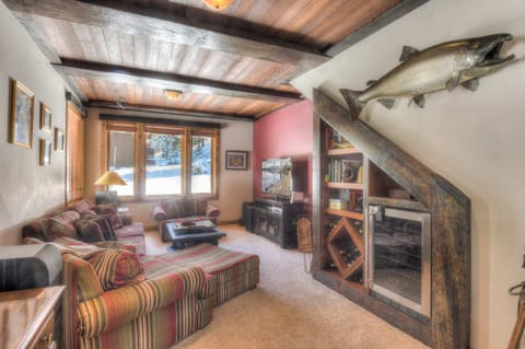 Den with smart TV and board games