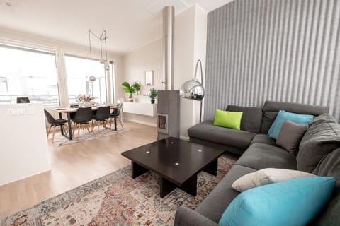 Luxury Penthouse, City View | Living area | 52-inch flat-screen TV with cable channels