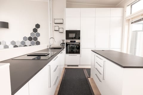 Luxury Penthouse, City View | Private kitchen | Full-size fridge, microwave, oven, dishwasher