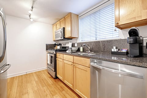 Superior Townhome, Patio | Private kitchen | Fridge, microwave, oven, stovetop