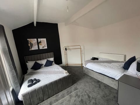 A serene bedroom space designed with natural materials and calming colors, providing a peaceful ambiance for rest and rejuvenation.