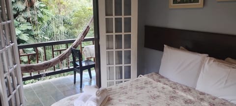 Desk, laptop workspace, blackout drapes, iron/ironing board