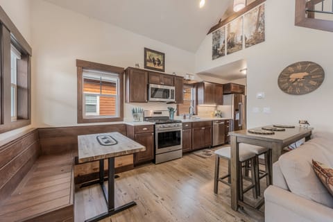 Kitchen dining booth with an additional seating at the island