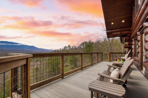 Sunrise views from the upper terrace, with mountain ridgelines and peaceful Smoky Mountain scenery.