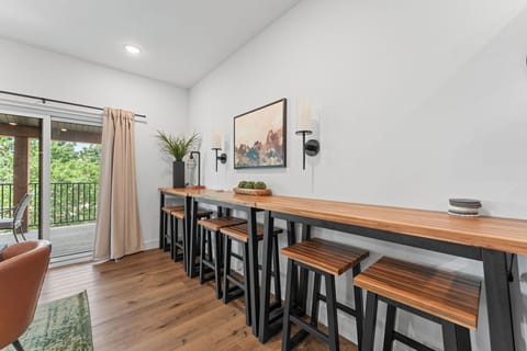 - High-top bar with additional seating and fun “adventure” wall art
-Perfect for extra seating or good area