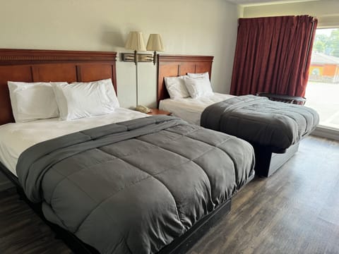 Standard Room, 2 Queen Beds, Non Smoking | Free WiFi, bed sheets