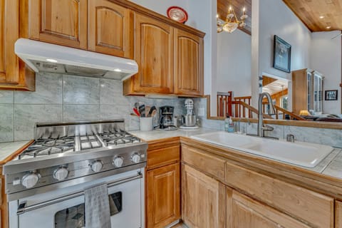 Kitchen: Crockpot, drip coffee maker, toaster oven, blender, dishwasher, cooking utensils, main floor