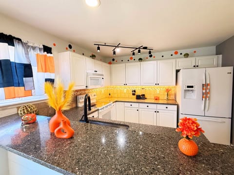 Chef’s Dream Kitchen – Cook with ease in our fully equipped kitchen, featuring modern appliances, ample counter space, and all the essentials to whip up a delicious meal.