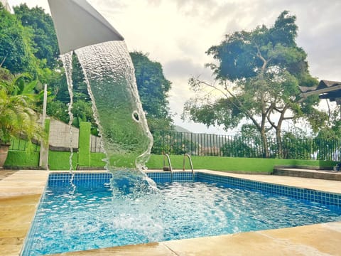 Outdoor pool, open 9:00 AM to 2:00 PM, free cabanas, pool umbrellas