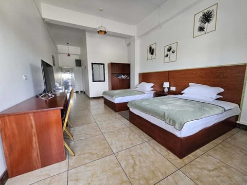 Comfort Double Room, City View | In-room safe, desk, laptop workspace, iron/ironing board