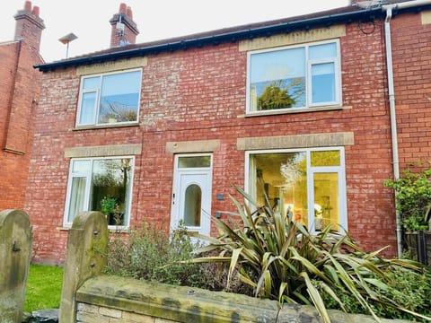 [Exterior] with roadside parking at the front