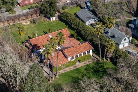 ✨ A slice of paradise! This beautiful home, surrounded by lush greenery and palm trees, is the perfect retreat.