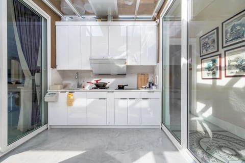 Comfort Double Room, City View | Private kitchen | Fridge, microwave, stovetop, coffee/tea maker