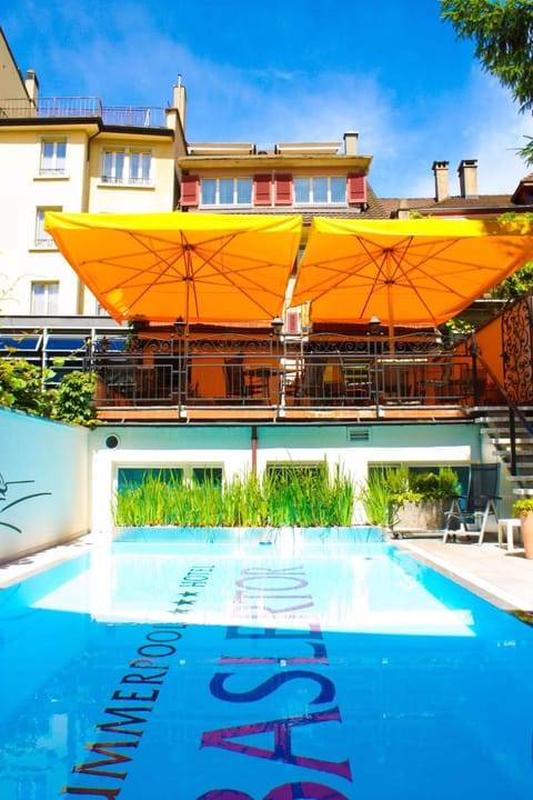 Seasonal outdoor pool, open 10:00 AM to 9:00 PM, sun loungers