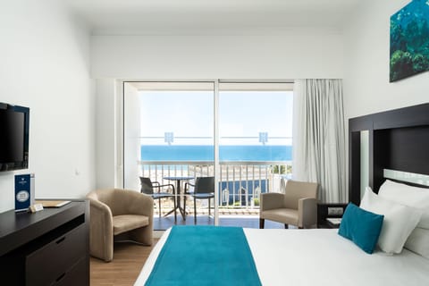 Premium Double or Twin Room, Sea View | Minibar, in-room safe, desk, laptop workspace