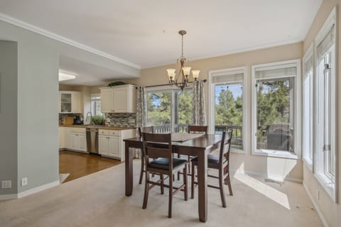 Natural light pours into this dining room. Step outside and dine alfresco or grill up something yummy on the gas grill. Welcome to Birdie's Nest!