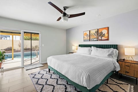 This king suite features a walk-in closet and direct access to the patio and pool area