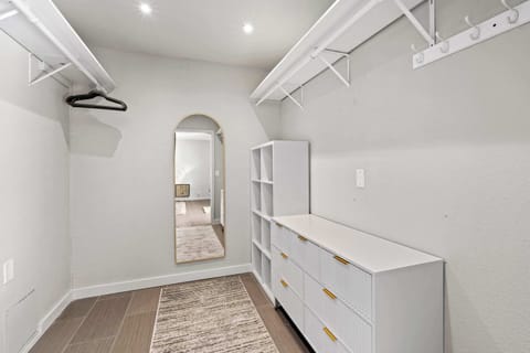 This king suite features a walk-in closet and direct access to the patio and pool area