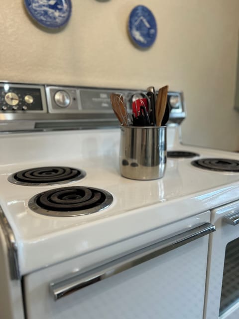 Stove, Oven, Pots and Pans Storage.