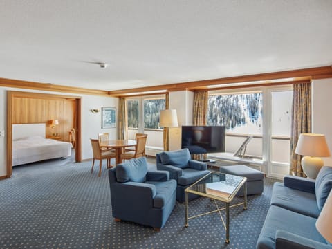 Deluxe Suite, Balcony, Mountain View | Living area | 42-inch flat-screen TV with satellite channels