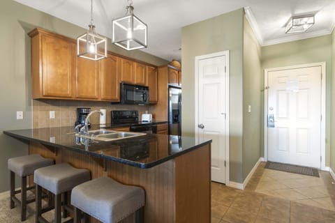 Unit 331’s open kitchen offers ample space & every home comfort