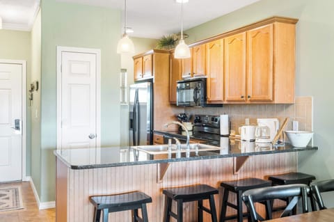 The open kitchen in Unit 330 is ideal for whipping up culinary masterpieces