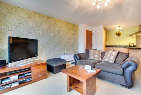 Comfort Apartment | Living area | Flat-screen TV