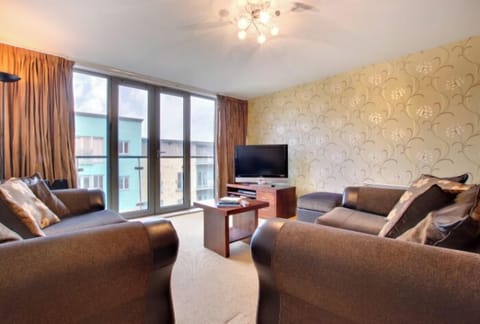 Comfort Apartment | Living area | Flat-screen TV