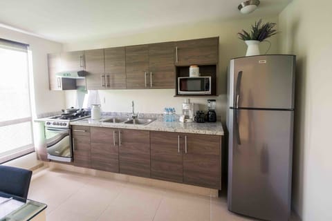 Premium Villa, 2 Bedrooms | Private kitchenette | Full-size fridge, microwave, stovetop, coffee/tea maker