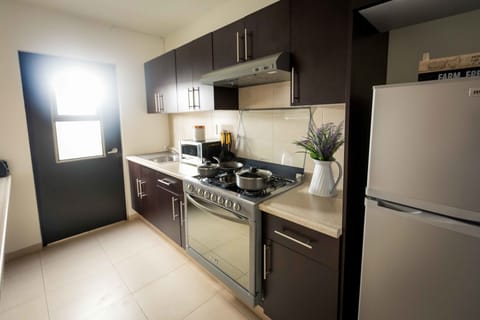 Premium Villa, 3 Bedrooms | Private kitchenette | Full-size fridge, microwave, stovetop, coffee/tea maker