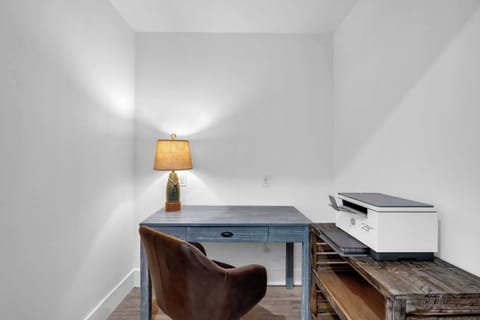 Desk area with printer for catching up on work in Bedroom 2